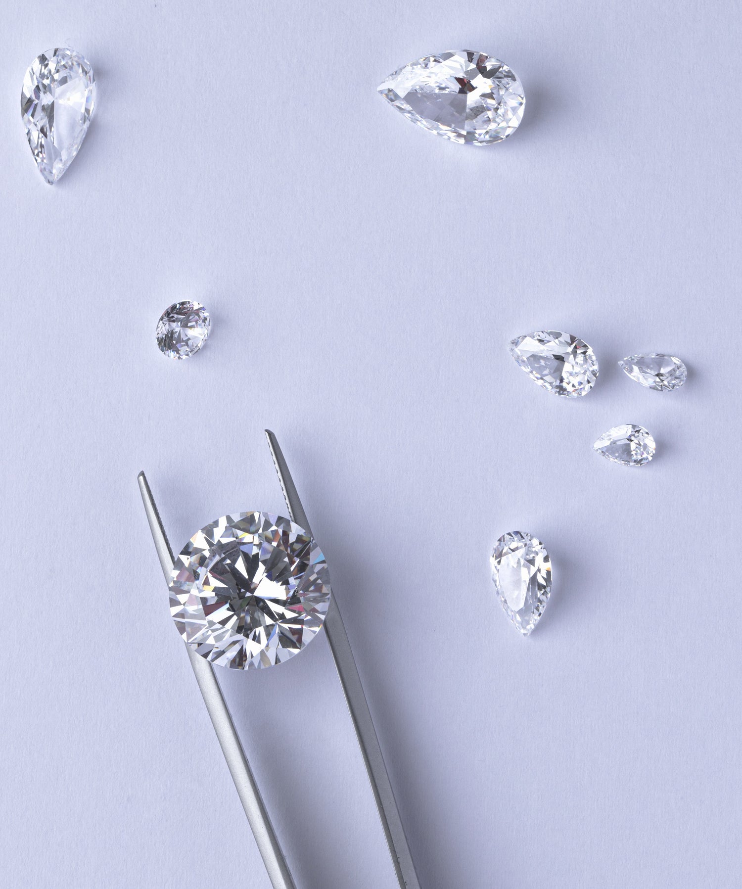 how to choose a diamond, diamond buying guide, diamond carats, size of diamonds, 1 carat diamond, lab grown diamonds, manmade diamonds